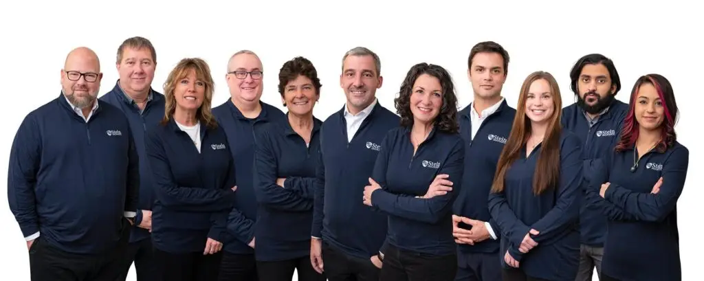 a group of people posing for a photo - Stein Insurance TEam Photo